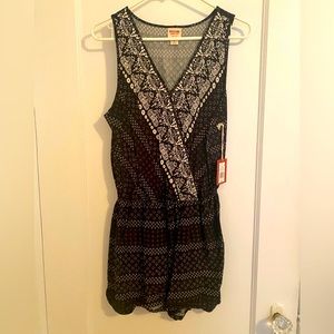 Black and white romper with tags on, never worn
